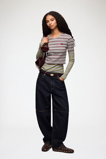 Model wearing jeans and striped long-sleeve
